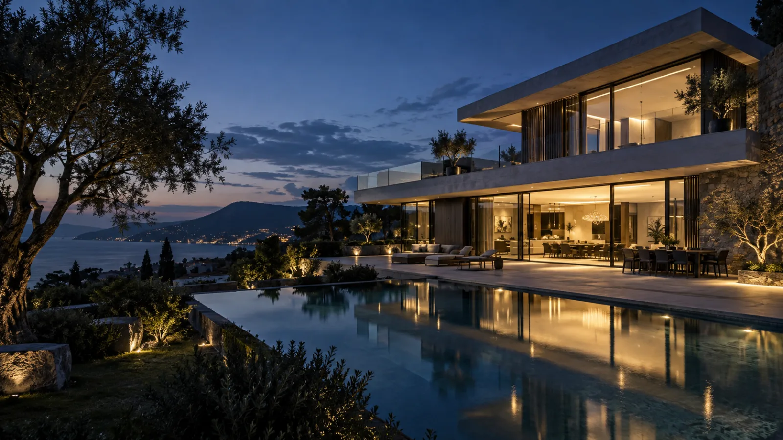Contemporary villa and pool at blue hour